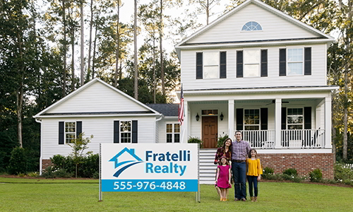 Wholesale 4mm Corrugated Plastic Sign for a Fratelli Reality on the front lawn next to a family of four.